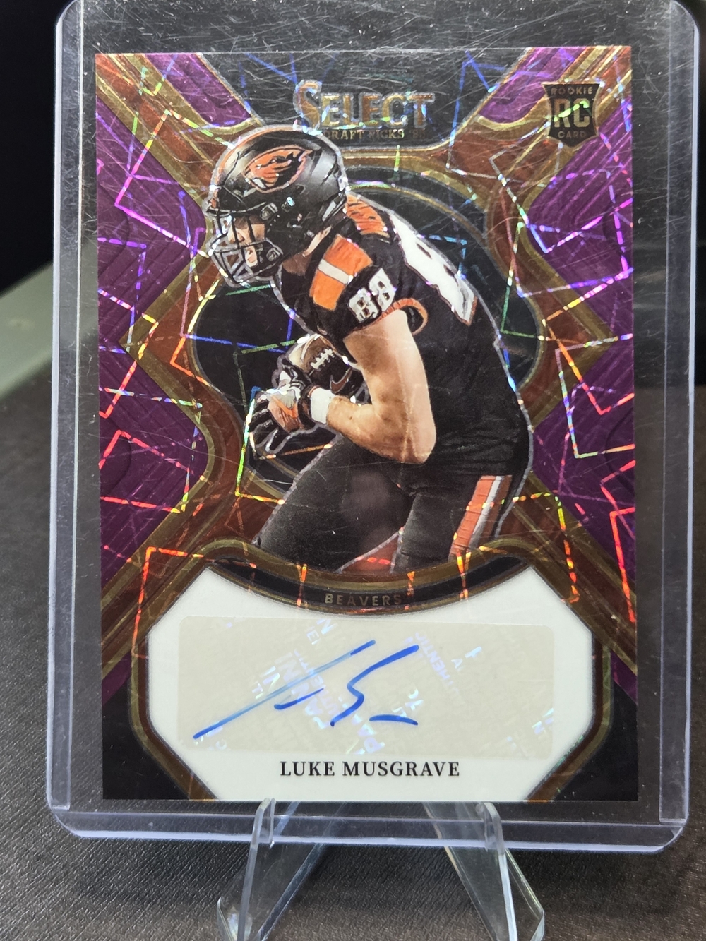 This is a 2023 Panini Select Draft Picks Luke Musgrave Rookie Signature card.